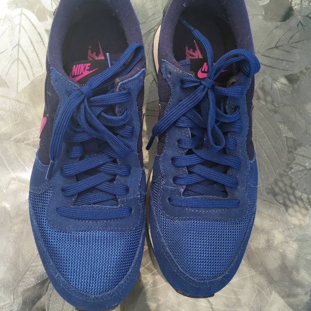 Blue and purple Nike internationalist sneakers